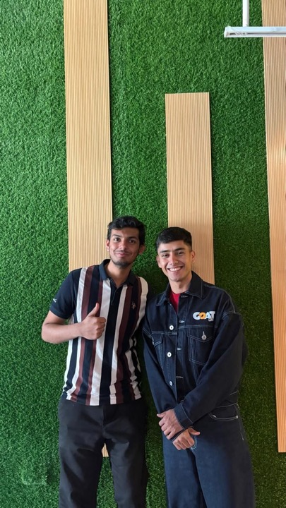 Nimitt seated in conversation with Yash Kalra, founder of GOAT LIFE, who is wearing a GOAT jacket